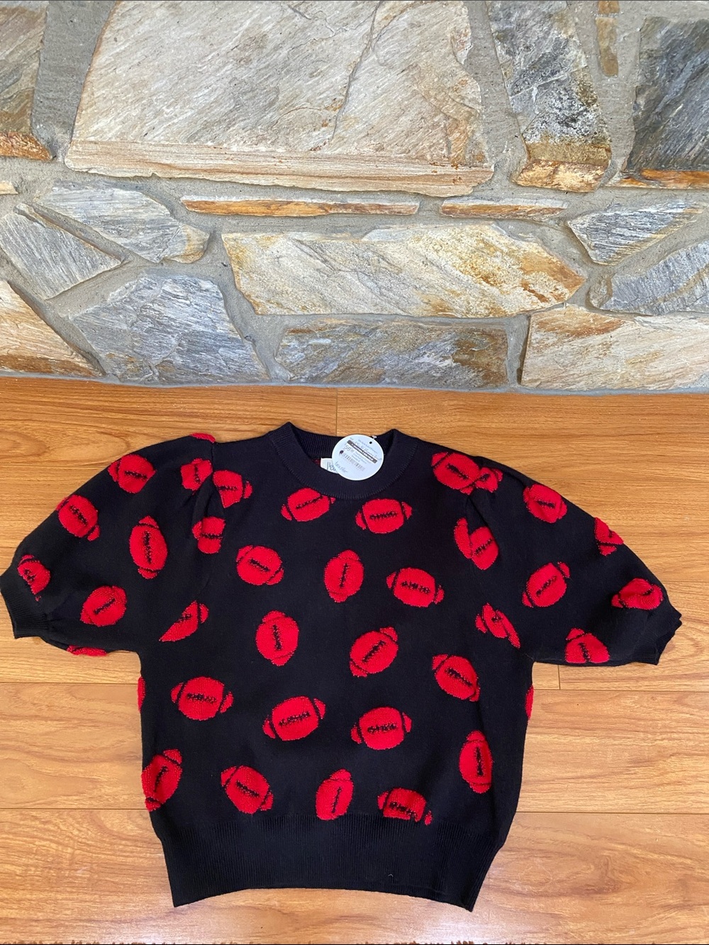 Black Sweater with Red Football Print.  Size Small